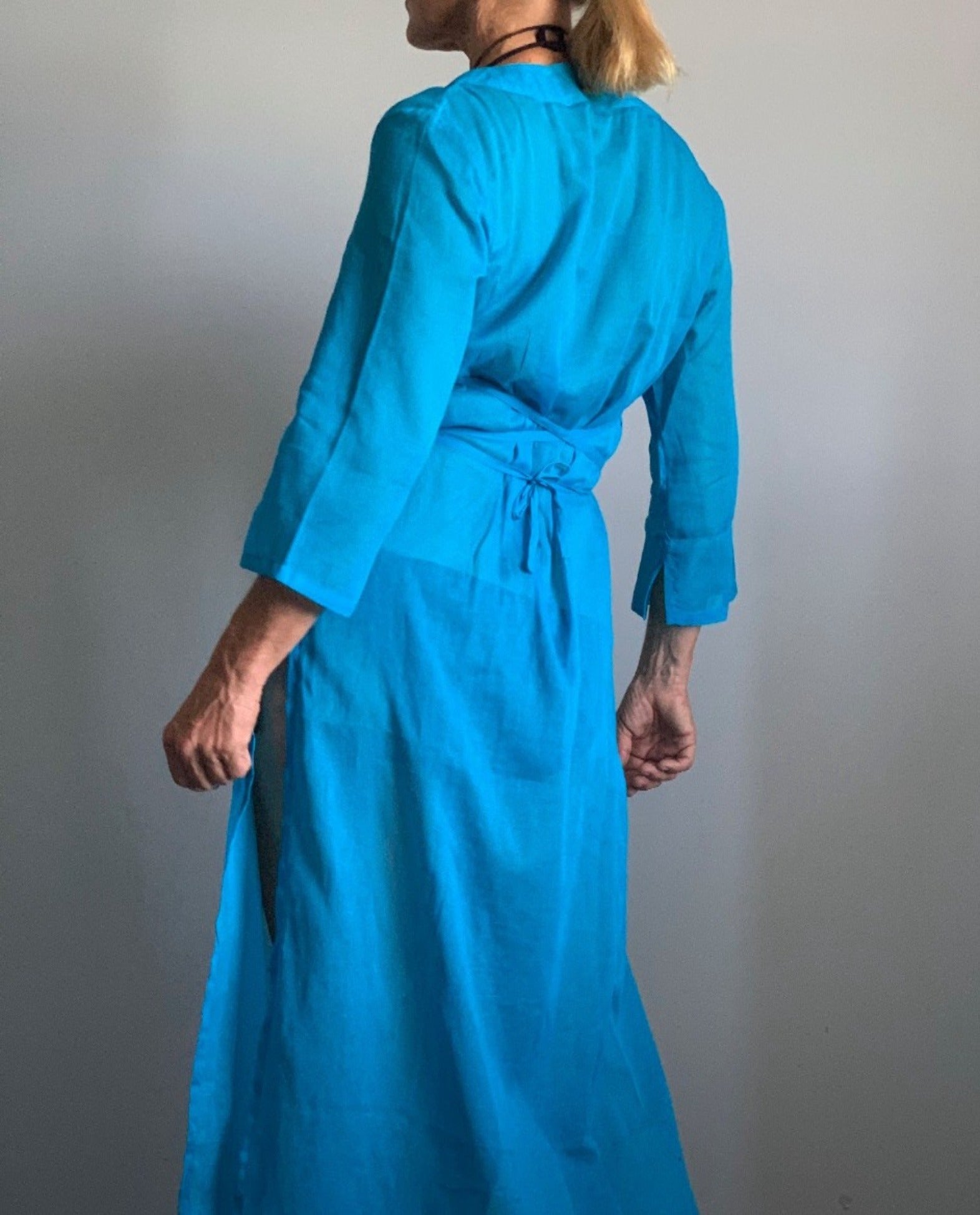 A woven cotton voile tunic dress in Antiguan Blue